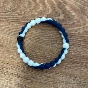 Dark blue and white swirl Lokai bracelet​​​​​​